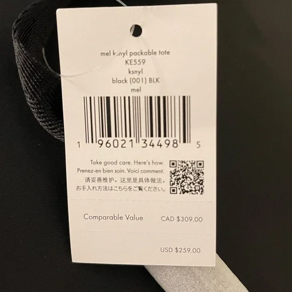 Kate Spade New York Mel Packable Nylon Tote with detachable wristlet - Black - Picture 7 of 7